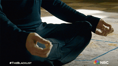 A Man Sits In A Lotus Position With #Theblacklist On The Bottom GIF