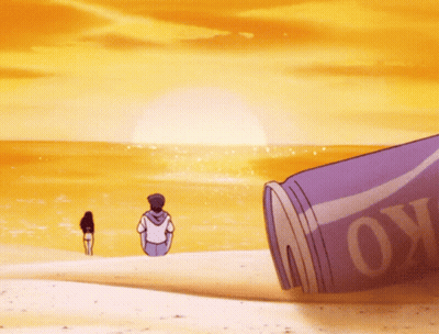A Man Sits On A Beach Next To A Can That Says " Move " GIF