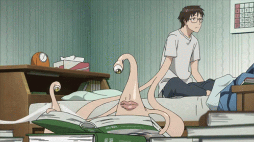 A Man Sits On A Bed Next To A Monster Reading A Book With A Calendar On The Wall That Shows The Month Of July GIF