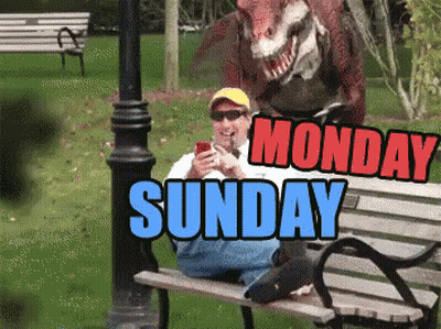 A Man Sits On A Park Bench With A Dinosaur Behind Him And The Words Monday Sunday GIF