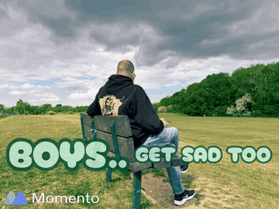 A Man Sits On A Park Bench With The Words " Boys Get Sad Too " Below Him GIF