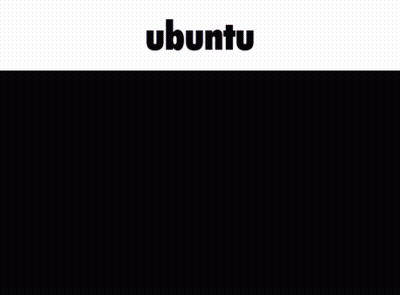 A Man Sitting At A Desk Using A Laptop With The Word Ubuntu On The Bottom GIF