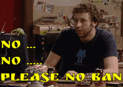 A Man Sitting At A Desk With A Can Of Coke On The Table GIF