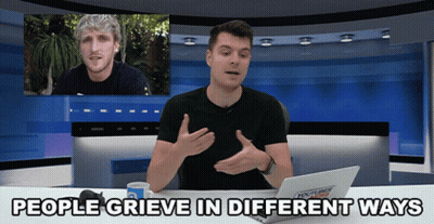 A Man Sitting At A Desk With A Laptop And The Words People Grieve In Different Ways On The Bottom GIF