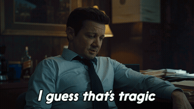A Man Sitting At A Desk With The Words " I Guess That 'S Tragic " Above Him GIF