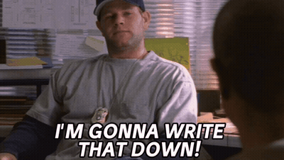 A Man Sitting At A Desk With The Words I 'M Gonna Write That Down On His Shirt GIF
