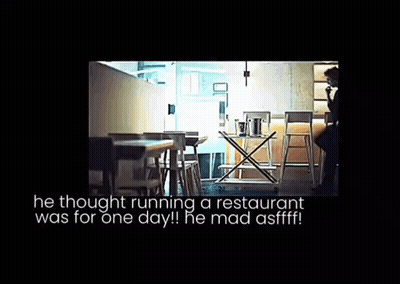 A Man Sitting At A Table In A Restaurant With The Words " He Thought Running A Restaurant Was For One Day " GIF