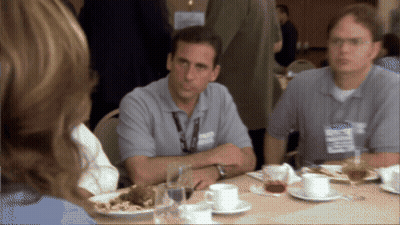 A Man Sitting At A Table With A Name Tag That Says ' Steve Jobs ' On It GIF