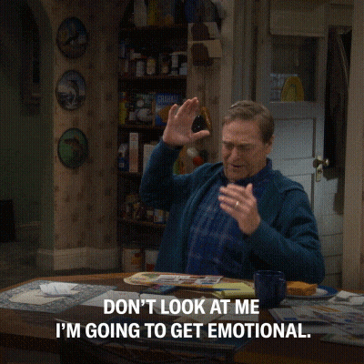 A Man Sitting At A Table With The Words " Don 'T Look At Me I 'M Going To Get Emotional " Above Him GIF