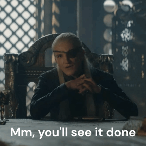 A Man Sitting At A Table With The Words Mm You 'Ll See It Done On The Bottom GIF