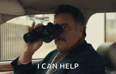 A Man Sitting In A Car Looking Through Binoculars With The Words " I Can Help " Above Him GIF