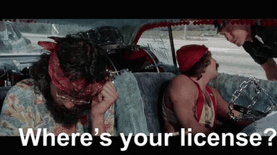 A Man Sitting In A Car Talking To A Police Officer With The Words " Where 'S Your License " Below Him GIF