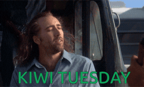 A Man Sitting In A Car With The Words Kiwi Tuesday Written Below Him GIF