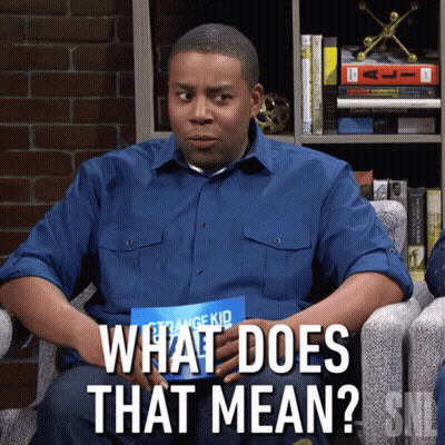 A Man Sitting In A Chair Holding A Strange Kid Book And The Words What Does That Mean GIF