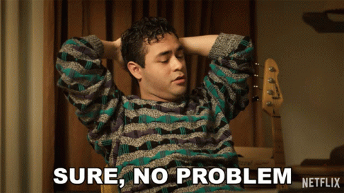 A Man Sitting In A Chair With His Hands Behind His Head Says Sure No Problem Netflix GIF