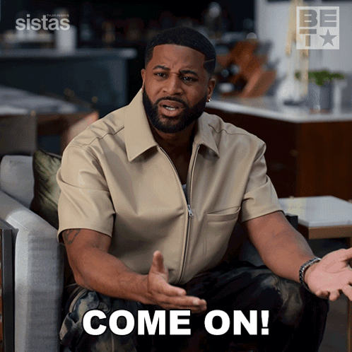 A Man Sitting In A Chair With The Words Come On Written On The Bottom GIF