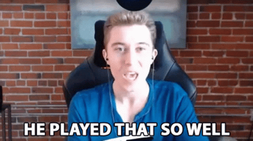 A Man Sitting In A Chair With The Words He Played That So Well Above Him GIF