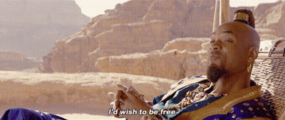 A Man Sitting In A Chair With The Words " I 'D Wish To Be Free " Below Him GIF