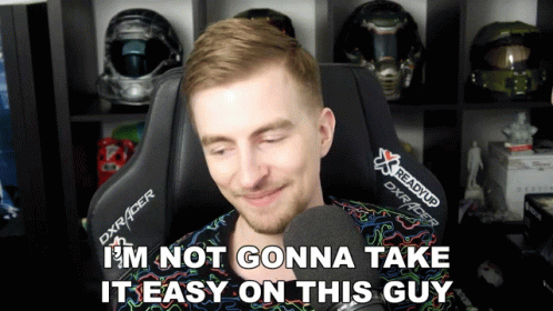 A Man Sitting In A Chair With The Words " I 'M Not Gonna Take It Easy On This Guy " Next To Him GIF