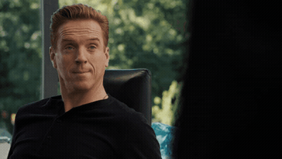 A Man Sitting In A Chair With The Words " I Need To See It " On The Bottom GIF