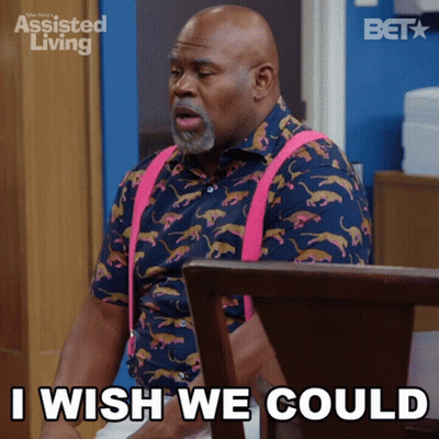 A Man Sitting In A Chair With The Words I Wish We Could GIF