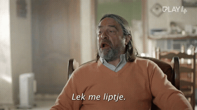 A Man Sitting In A Chair With The Words Lek Me Liptje On The Screen GIF