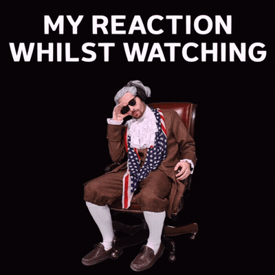 A Man Sitting In A Chair With The Words My Reaction Whilst Watching GIF