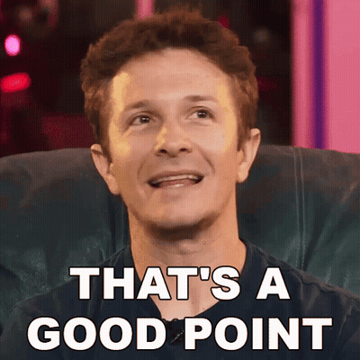 A Man Sitting In A Chair With The Words That 'S A Good Point Written On His Face GIF