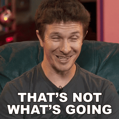 A Man Sitting In A Chair With The Words That 'S Not What 'S Going Behind Him GIF