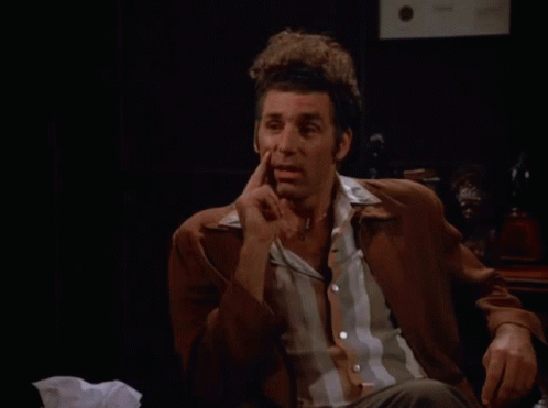 A Man Sitting In A Chair With The Words That 'S True Behind Him GIF