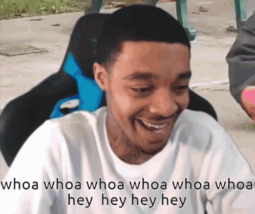 A Man Sitting In A Chair With The Words Whoa Whoa Whoa Whoa Hey Hey Hey GIF