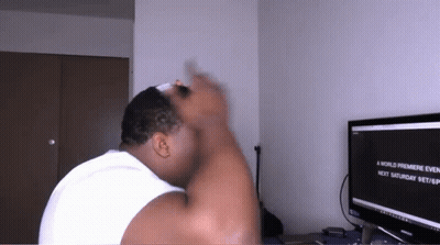 A Man Sitting In Front Of A Computer Screen That Says A World Premiere Even Next Saturday 9 Pm GIF