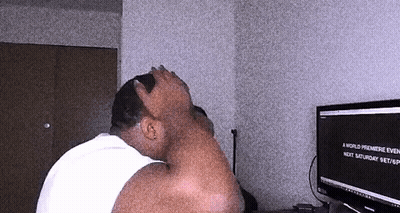 A Man Sitting In Front Of A Computer Screen That Says A World Premiere Event Next Saturday Sept GIF