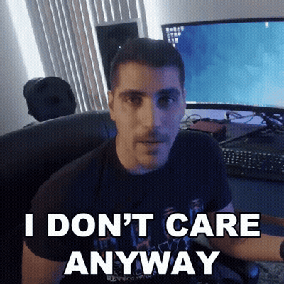A Man Sitting In Front Of A Computer With The Words I Don 'T Care Anyway GIF