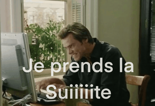 A Man Sitting In Front Of A Computer With The Words Je Prends La Suiiiiite Written On The Screen GIF
