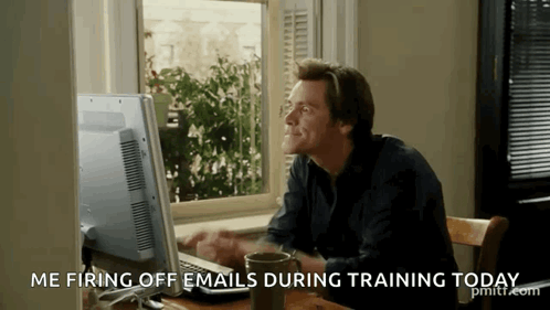 A Man Sitting In Front Of A Computer With The Words Me Firing Off Emails During Training Today Below Him GIF