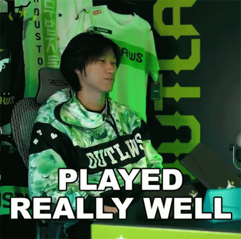 A Man Sitting In Front Of A Computer With The Words " Played Really Well " Above Him GIF