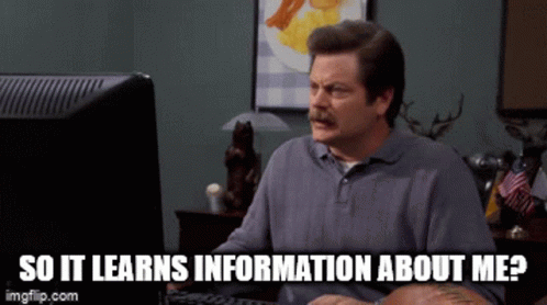 A Man Sitting In Front Of A Computer With The Words So It Learns Information About Me Written Below Him GIF