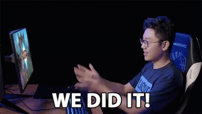 A Man Sitting In Front Of A Computer With The Words We Did It Written On The Screen GIF