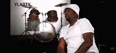 A Man Sitting In Front Of A Drum Set With Vladtv Written In The Corner GIF