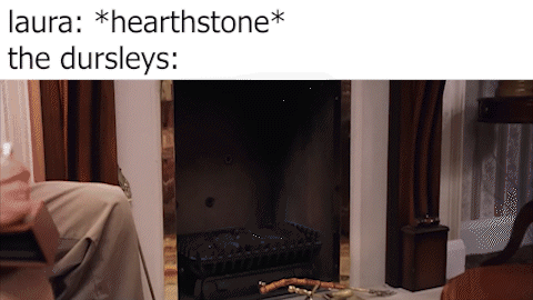 A Man Sitting In Front Of A Fireplace With The Words Laura * Heartstone * The Dursleys GIF