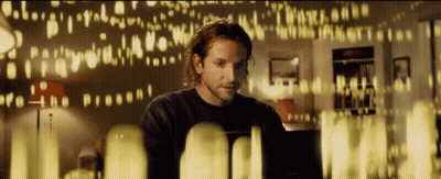 A Man Sitting In Front Of A Laptop With The Word Present Visible GIF