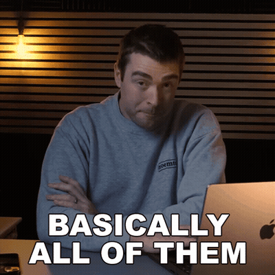A Man Sitting In Front Of A Laptop With The Words Basically All Of Them Written Below Him GIF
