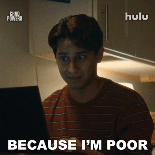 A Man Sitting In Front Of A Laptop With The Words " Because I 'M Poor " Below Him GIF