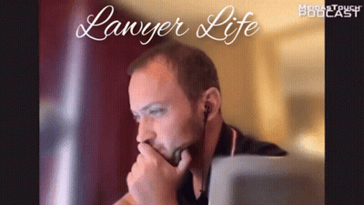 A Man Sitting In Front Of A Laptop With The Words " Lawyer Life " On The Bottom GIF