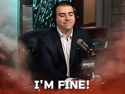 A Man Sitting In Front Of A Microphone With The Words I 'M Fine On The Bottom GIF