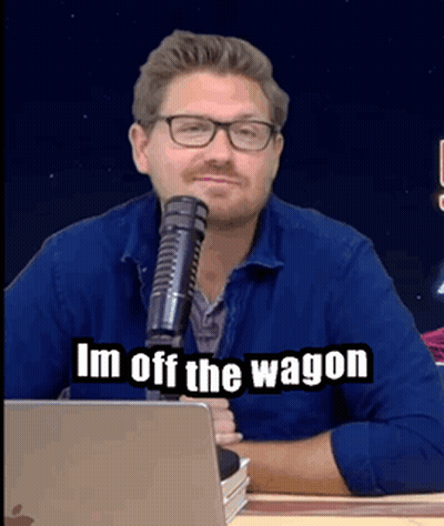 A Man Sitting In Front Of A Microphone With The Words Im Off The Wagon Written Below Him GIF