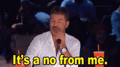 A Man Sitting In Front Of A Microphone With The Words It 'S A No From Me . GIF