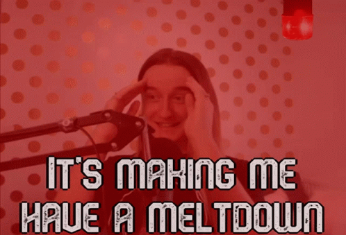 A Man Sitting In Front Of A Microphone With The Words " It 'S Making Me Have A Meltdown " Above Him GIF