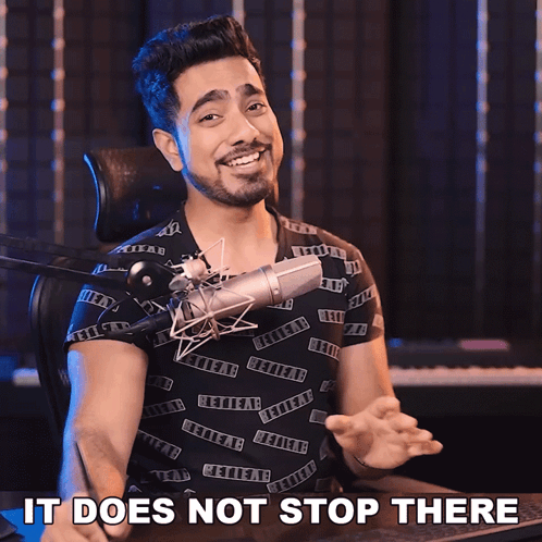 A Man Sitting In Front Of A Microphone With The Words It 'S Mind Boggling Behind Him GIF